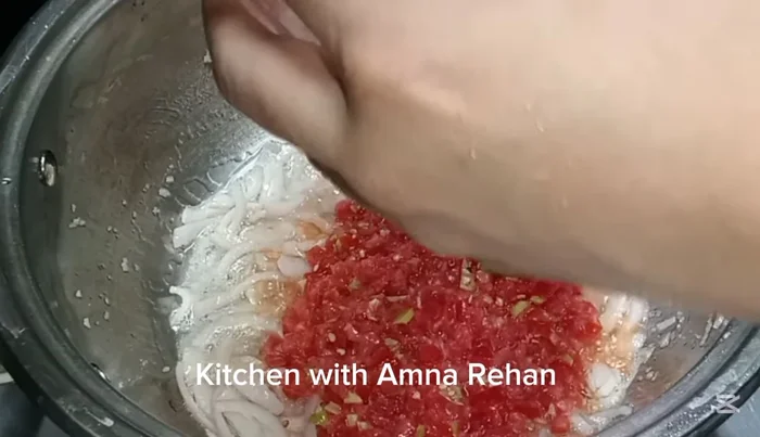 Add the chopped tomatoes and green chilies. Saute for a few minutes.
