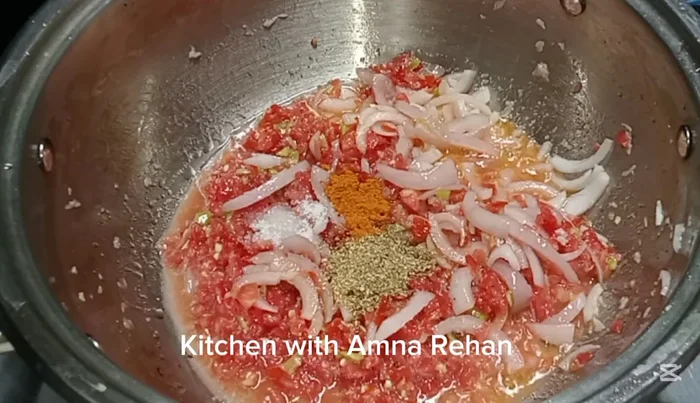 Add salt, coriander powder, turmeric powder, red chili powder, and roasted cumin seeds. Mix well.