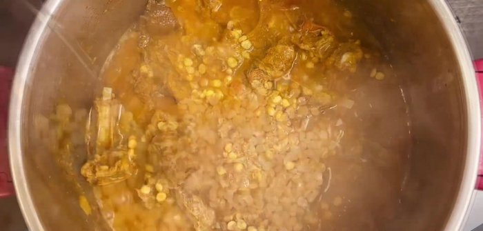 Add soaked lentils and 1 cup of hot water. Simmer for 7-8 minutes or until lentils are cooked.