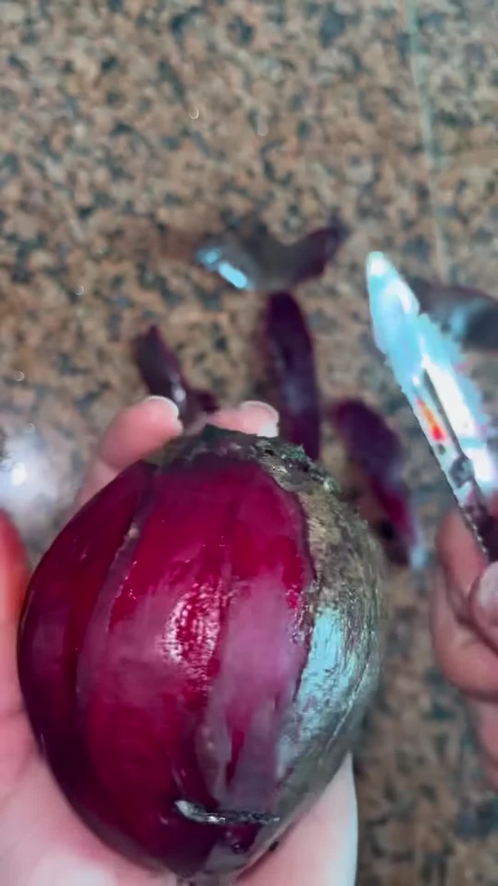 Grind the beetroot with onion, green chilies, and coriander. Don't make the beetroot pieces too big; it will take longer to grind.