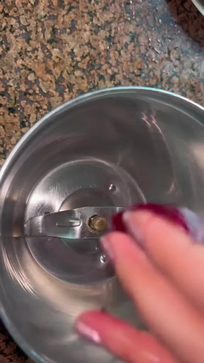 Add salt to the mixture and grind until you have a fine paste.
