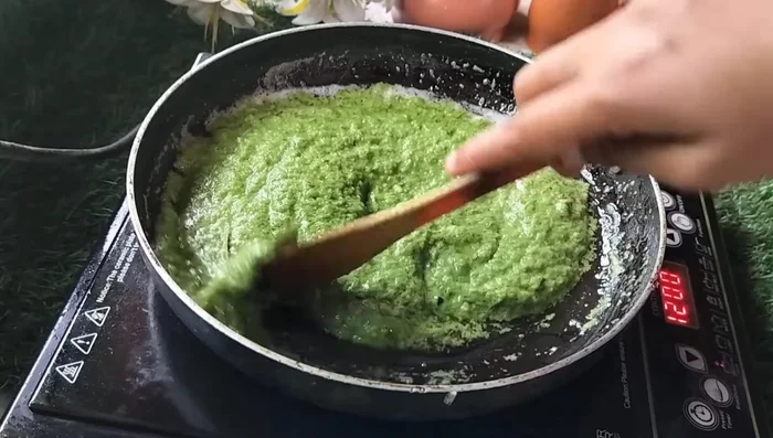 Add the spice paste to the pan, stir well, and cook on medium heat until the oil separates slightly. (198.4)