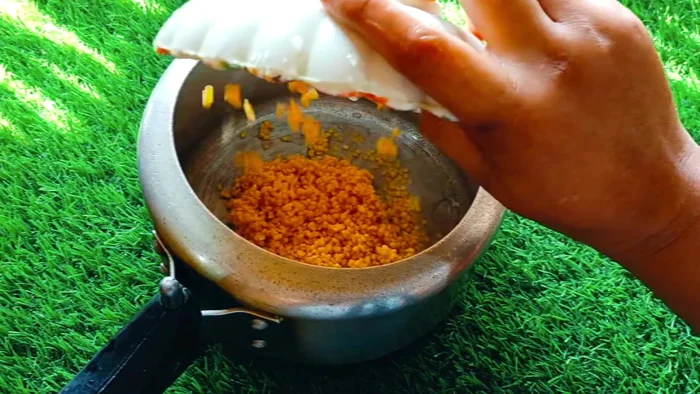 Prepare the sambar: Wash and pressure cook moong dal with gourd and other vegetables (optional), adding water, turmeric, and salt.