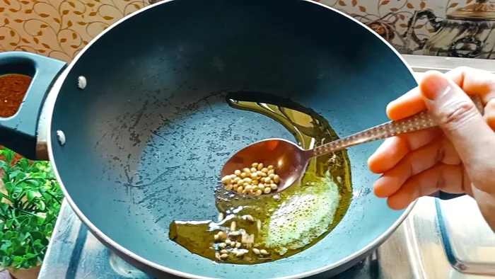 Prepare the sambar masala: Heat oil, add mustard seeds, coriander seeds, fenugreek seeds, asafoetida, and curry leaves. Fry briefly.