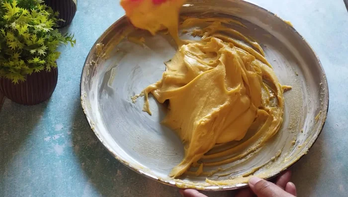 Gather the dough together and cover it with a damp cloth. Let it rest for 10-15 minutes to allow the flour to soften and swell.