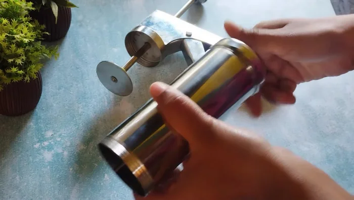 If using a papdi making machine, fill the hopper about halfway full and operate the machine to create the papdi.