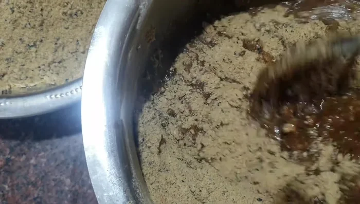 Mix all ingredients well, adding ghee as needed to achieve the desired consistency for laddu making.