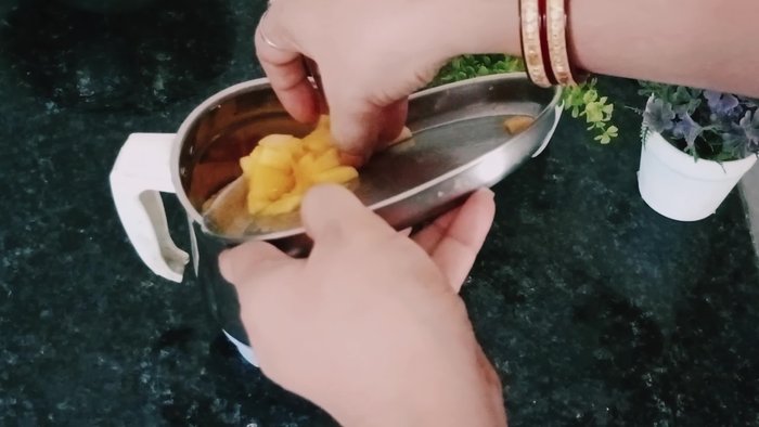 Put the mango pieces in a mixer jar and blend into a pulp.