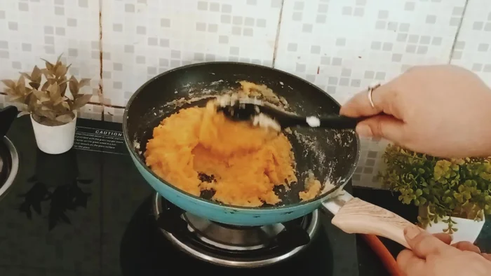 Continue stirring until the mixture thickens and leaves the sides of the pan.