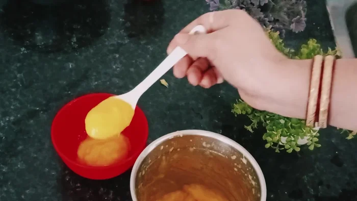 Transfer the mango pulp into a bowl.