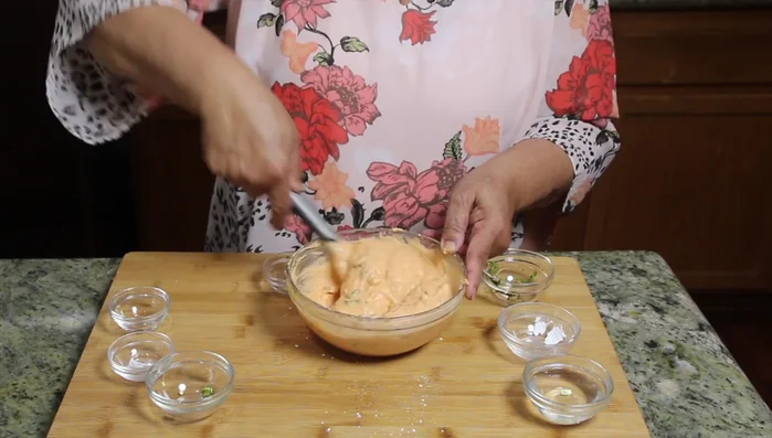 Adjust the batter's consistency; it should be thick but pourable. Add water one tablespoon at a time if needed.
