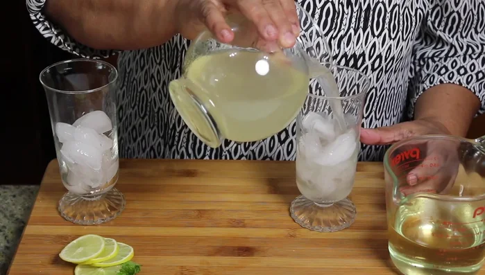 Serve Traditional Lemonade: Pour lemonade over ice cubes. Garnish with lemon slices and mint leaves.