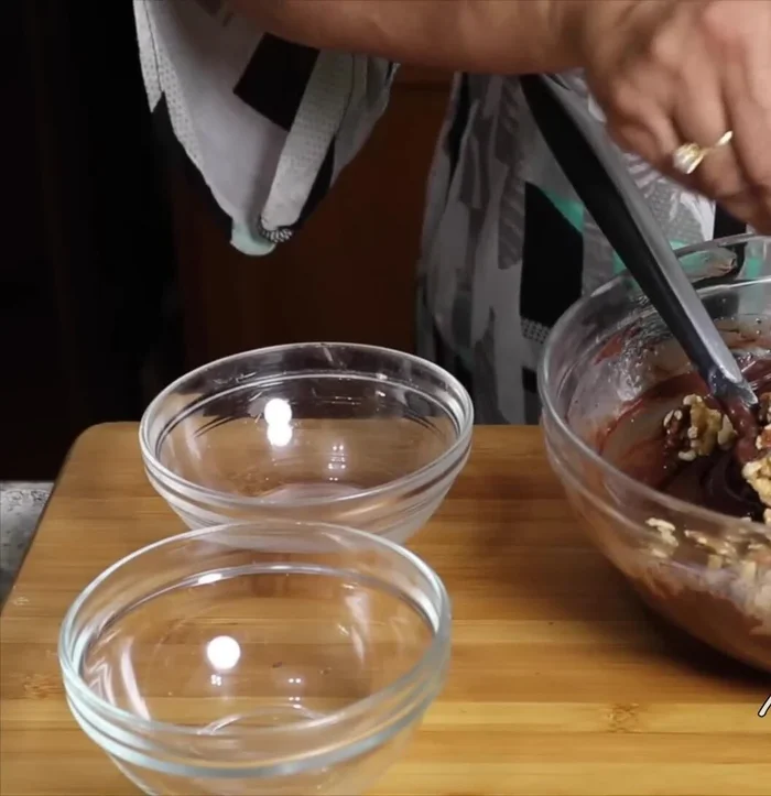 Stir in walnuts and vanilla extract. Mix gently; do not whip.