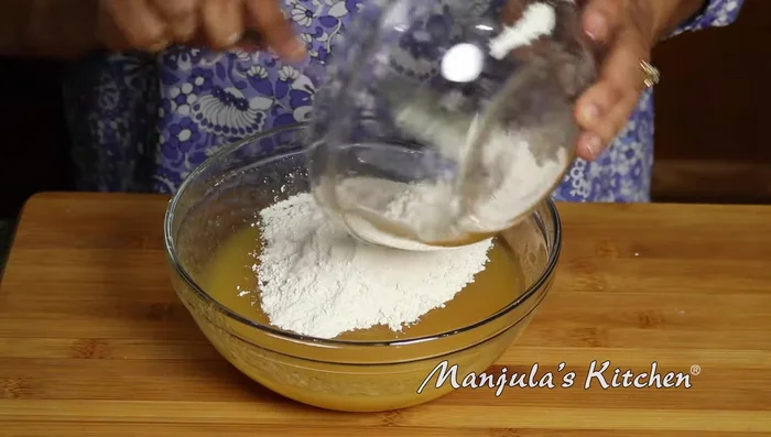 Gradually add the dry ingredients to the wet ingredients, mixing until everything is well combined. Do not overmix.