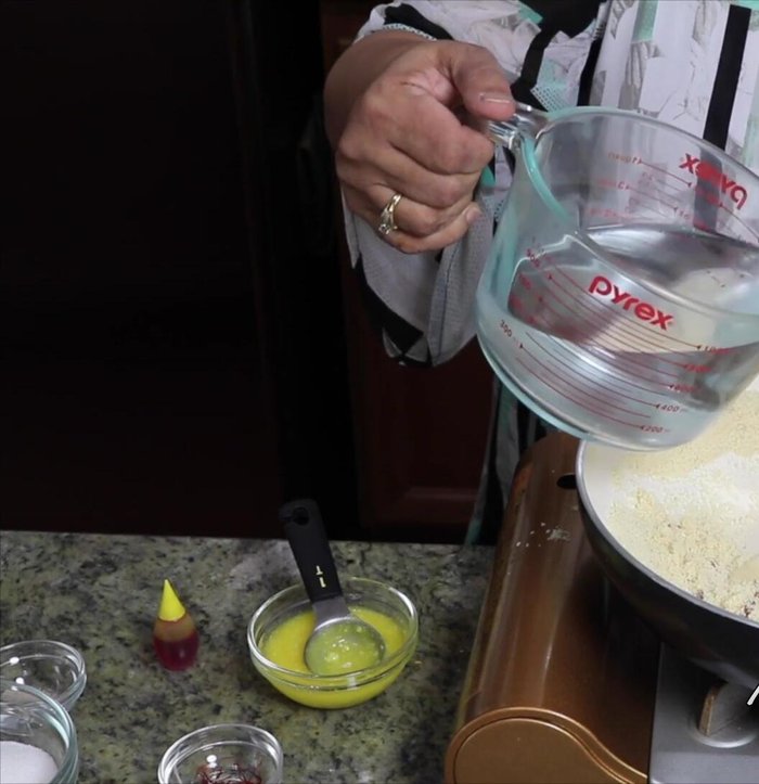 Reduce heat. Gradually add about half of the boiled water, as it will splatter.