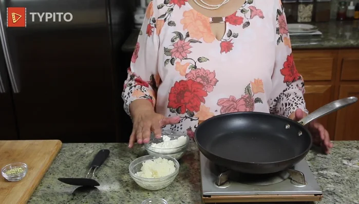 In a saucepan, combine sugar and milk. Cook over very low heat until the sugar dissolves completely and forms a thick syrup.