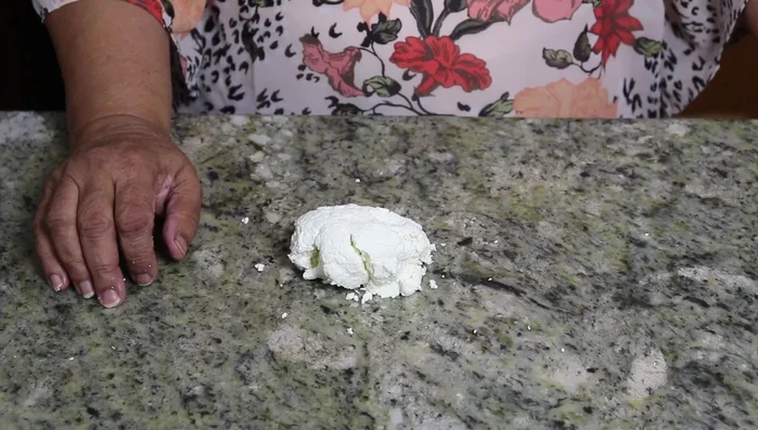 Knead the paneer on a clean, dry surface for about 1 minute until smooth and soft.