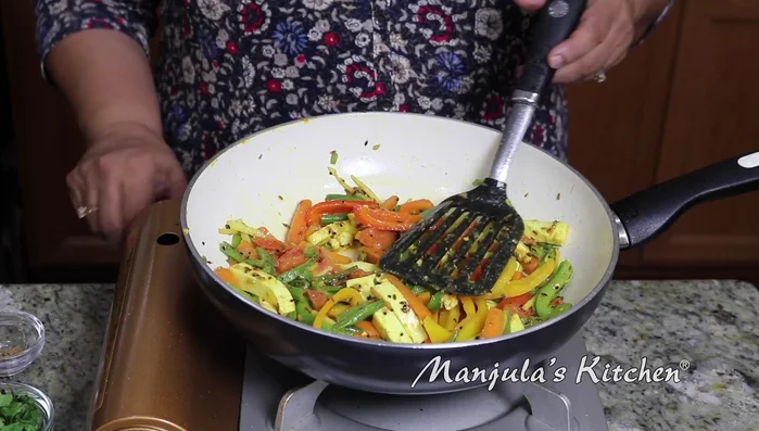 Turn off the heat. Add garam masala and cilantro; mix well.