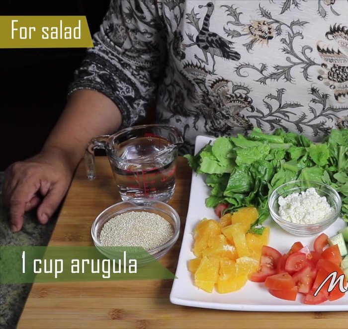Prepare the vegetables: Chop romaine lettuce, dice cucumber and tomato, and peel and dice the orange. (38.239)