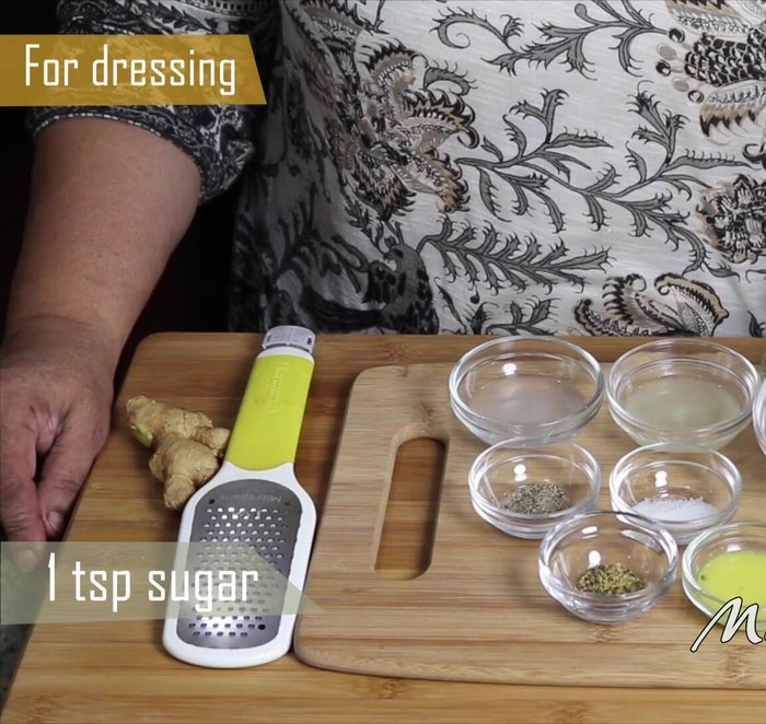 Prepare the dressing: In a small bowl, whisk together rice vinegar, lemon juice, olive oil, sugar, salt, pepper, mustard powder, and ginger juice until sugar dissolves. (72.2)