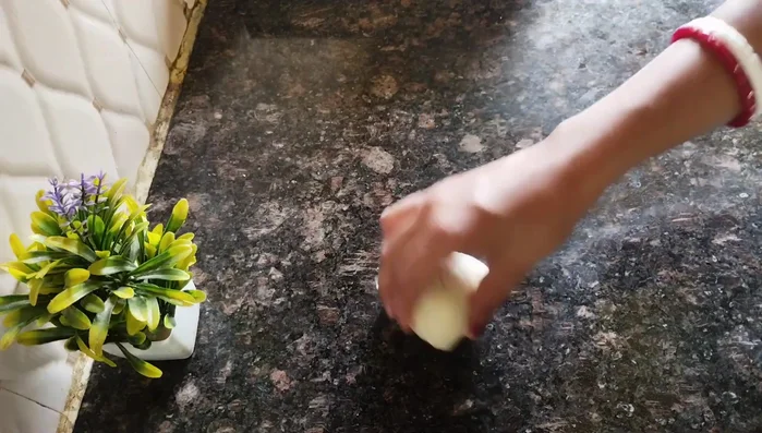 Cut the cylinder into pieces of desired size, and roll each piece into a thin, slightly thick circle.