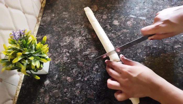 Cut the long rolled piece into smaller pieces. Gently flatten each piece.