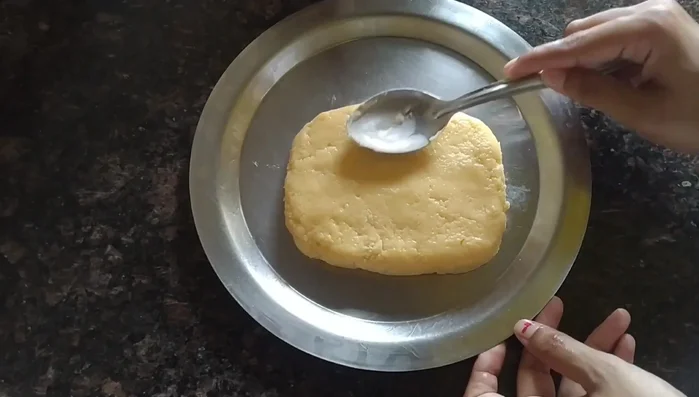 Allow the barfi to cool and set completely for at least 1-2 hours.