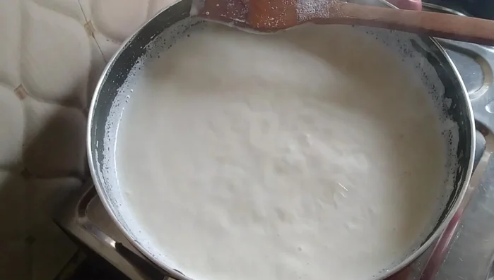 In a separate bowl, add saffron threads to a small amount of the warm milk to infuse color and set aside.