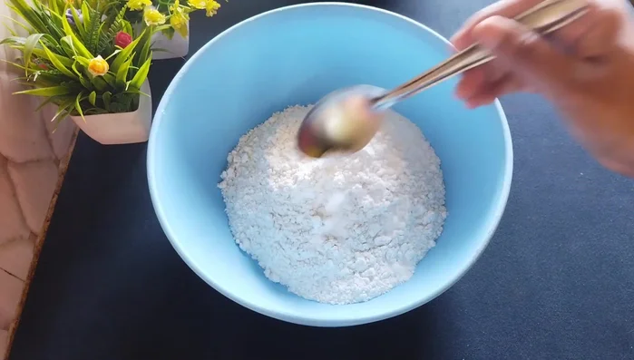 Prepare the dough: Combine refined flour, salt, and oil. Rub the oil into the flour until it resembles breadcrumbs. Gradually add water to form a stiff dough. Let it rest for 10-15 minutes.