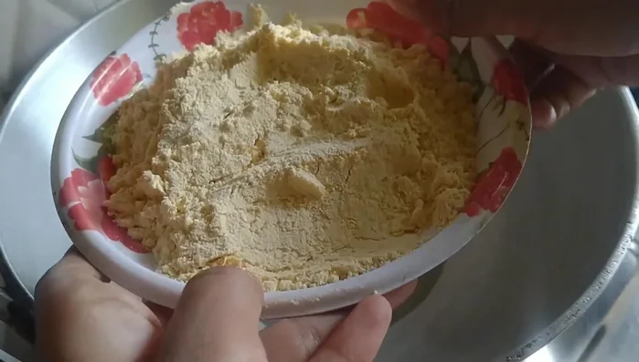 Sieve 2 cups of gram flour.