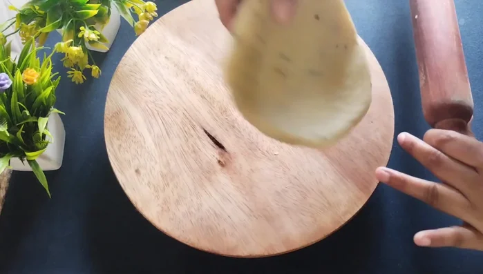 Roll out the dough to a thick sheet (not thin).