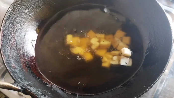 Fry the shakkarpara in batches on low heat until golden brown, turning occasionally to ensure even cooking. Avoid overcrowding the pan.
