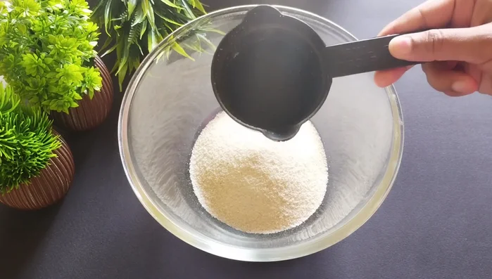 In a utensil, combine semolina, flour, sugar, and salt. Mix well.
