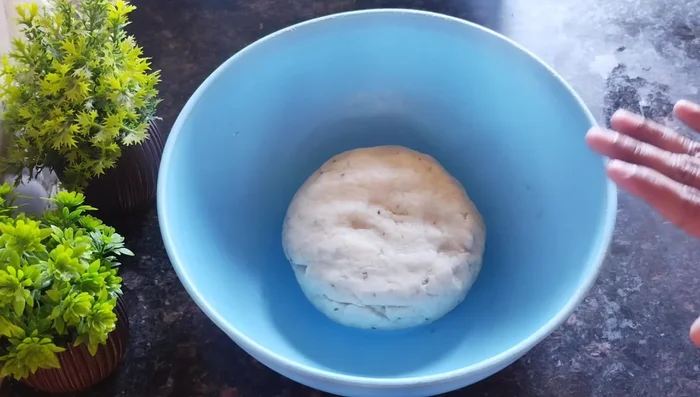 Cover and let the dough rest for 10-15 minutes.