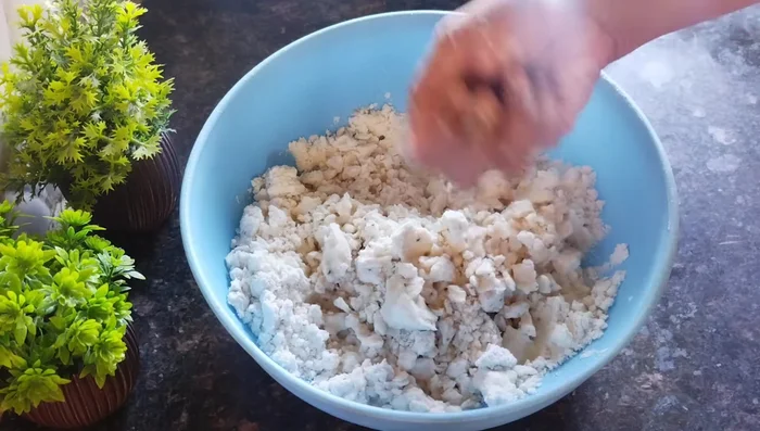 Gradually add water to make a stiff, not wet, dough.