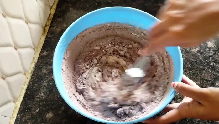 Mix the batter well in one direction until light and fluffy.