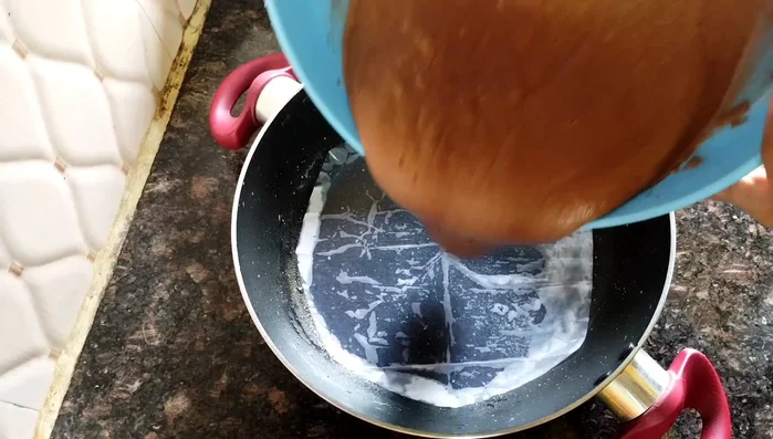 Pour the batter into the prepared pan.