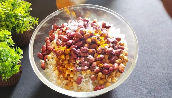 Add salt, turmeric powder, and Kashmiri red chili powder. Mix well while still hot.