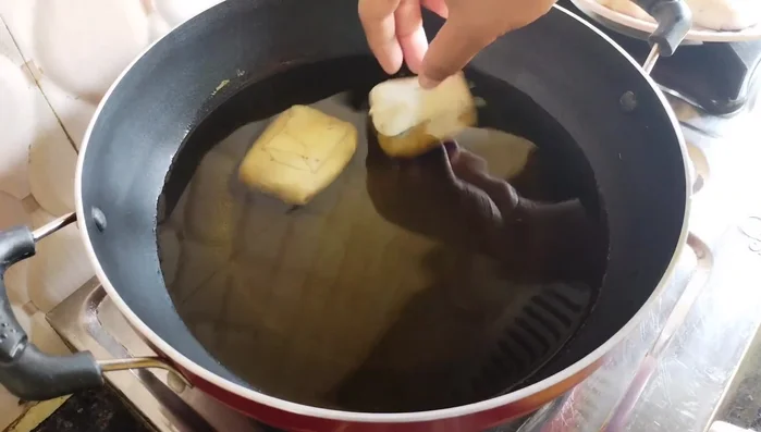 Heat oil in a pan. Fry the patties over low heat until golden brown, turning frequently to ensure even cooking. Avoid overcrowding the pan.