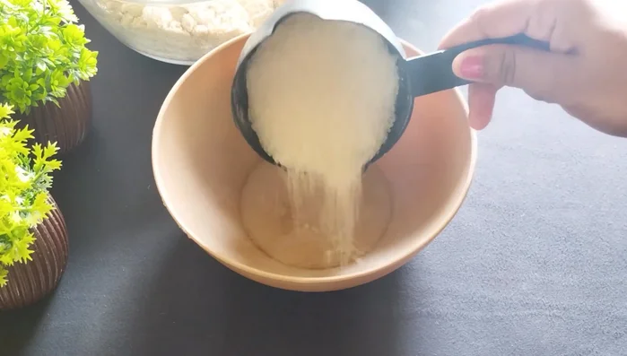 In a separate bowl, mix ½ cup sugar (or 1 cup) with a little water until slightly moistened. Do not melt the sugar.