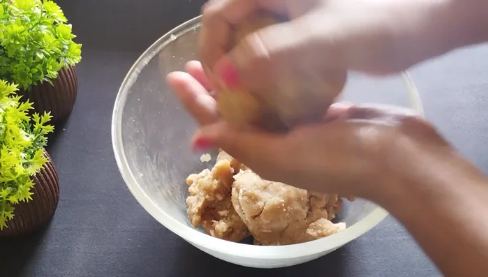 Divide the dough into small portions and roll each into a flat disc. You should see cracks in the dough.