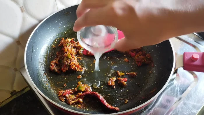 Add 1 teaspoon of water to prevent burning, and continue frying.