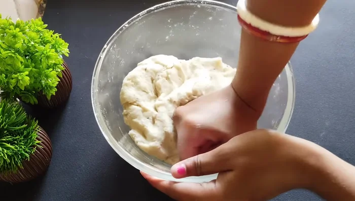 Knead the dough well, cover, and rest for 10-15 minutes.