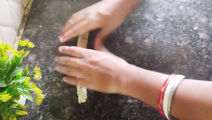 Tightly roll up each circle, pressing slightly to seal. Cut the ends and slice the roll into small pieces.