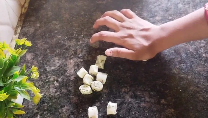 Flatten each piece slightly.
