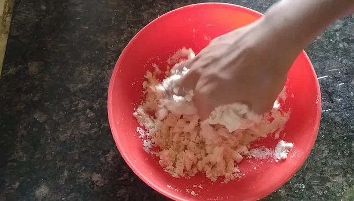 Add water gradually, kneading to form a very stiff, hard dough. Do not make it soft.
