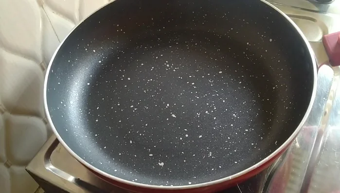 Heat a pan slightly. Pour a ladleful of batter onto the hot pan.