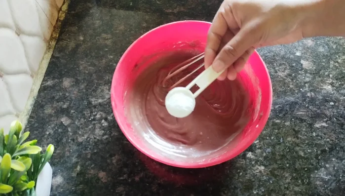 Add baking powder and baking soda to the dry ingredients. Mix well.