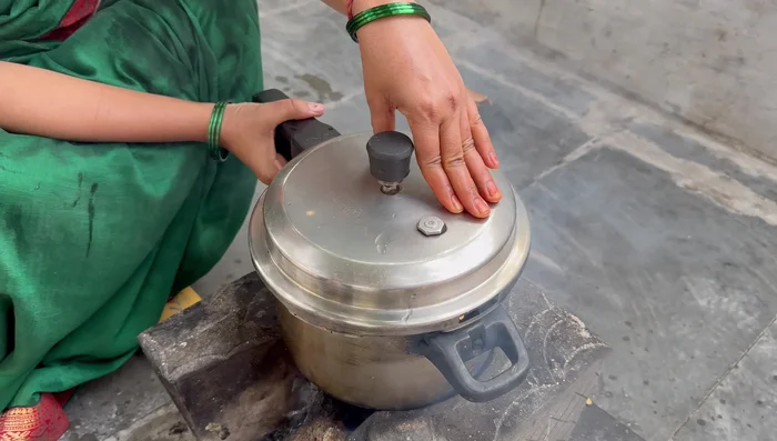 Prepare the dough: Mix the sifted wheat flour with salt and a little oil. Gradually add water and knead into a soft, pliable dough, similar to chapati dough. Let it rest for 30 minutes, covered with a wet cloth.