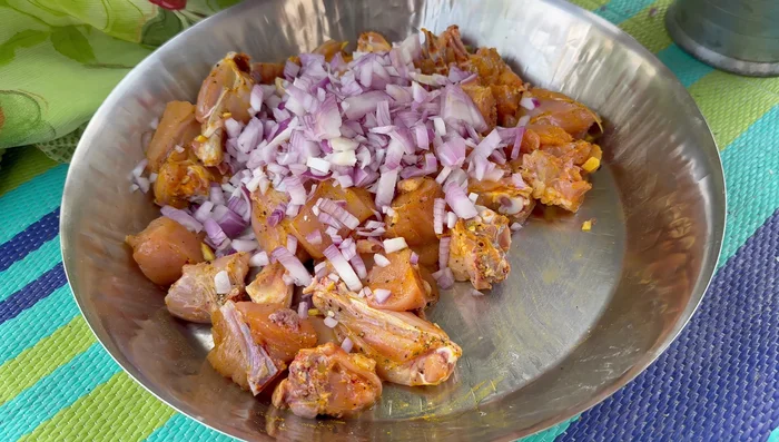 Add chopped onions, mix well, and let it marinate for 10 minutes.